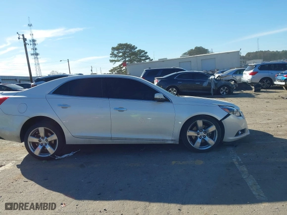 2014 Chevrolet Malibu LTZ with VIN 1G11J5SX7EF204252, listed as a IAAI auction lot 41439734 with 193,123 mi miles. Bid and sale history available at carsss.com. Image 13.