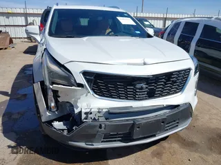 2022 Cadillac XT4 FWD Premium Luxury с VIN 1GYFZCR41NF169224, выставлен на аукционе IAAI как лот 41864717 с пробегом 34 183 миль миль и . История ставок и продаж доступна на DreamBid. Изображение 6.