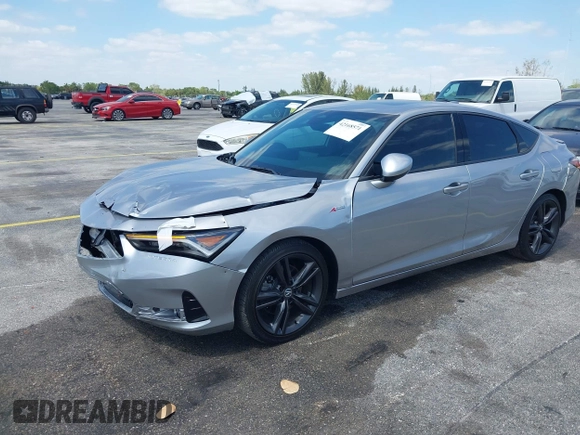 2023 Acura Integra w/A-Spec Package with VIN 19UDE4H39PA009519, listed as a IAAI auction lot 42168571 with 14,661 mi miles and . Bid and sale history available at DreamBid. Image 2.