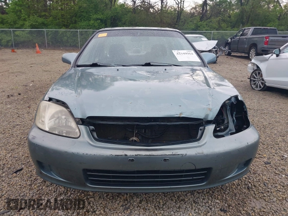 2000 Honda Civic EX z VIN 1HGEJ8644YL006150, wystawiony jako IAAI lot #42149964 z przebiegiem 195 489 mil mil oraz . Historia ofert i sprzedaży dostępna na DreamBid. Obrazek 13.