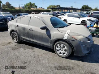 2011 Mazda Mazda3 i Sport with VIN JM1BL1UG3B1426274, listed as a Copart auction lot 73607564 with 180,682 mi miles and Salvage Title. Bid and sale history available at carsss.com. Image 4.