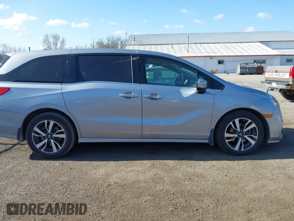 2018 Honda Odyssey Elite z VIN 5FNRL6H91JB070355, wystawiony jako IAAI lot #41975916 z przebiegiem 147 022 mil mil oraz . Historia ofert i sprzedaży dostępna na DreamBid. Obrazek 14.