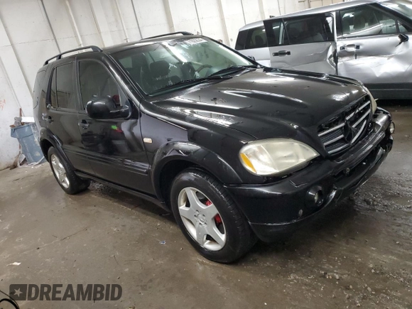 2000 Mercedes-Benz M-Class AMG with VIN 4JGAB74EXYA219143, listed as a Copart auction lot 71922634 with 156,092 mi miles and Salvage Title. Bid and sale history available at carsss.com. Image 4.