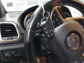 2014 Jeep Grand Cherokee Limited with VIN 1C4RJFBG5EC431019, listed as a IAAI auction lot 42402521 with 151,506 mi miles and . Bid and sale history available at DreamBid. Image 11.