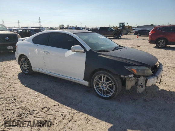 2009 Scion tC with VIN JTKDE167990297899, listed as a Copart auction lot 48591365 with 122,056 mi miles and Salvage Title. Bid and sale history available at carsss.com. Image 4.