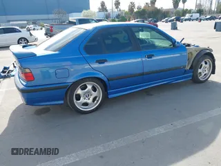 1997 BMW 3 Series with VIN WBSCD0325VEE10975, listed as a IAAI auction lot 41851847 with 209,106 mi miles and . Bid and sale history available at DreamBid. Image 4.