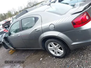 2013 Dodge Avenger SXT with VIN 1C3CDZCB5DN621881, listed as a IAAI auction lot 41739476 with 245,816 mi miles and . Bid and sale history available at DreamBid. Image 14.