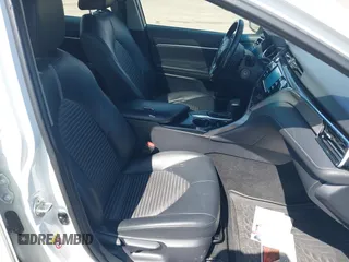 2018 Toyota Camry LE z VIN JTNB11HK2J3048094, wystawiony jako IAAI lot #42331953 z przebiegiem 239 000 mil mil oraz . Historia ofert i sprzedaży dostępna na DreamBid. Obrazek 5.
