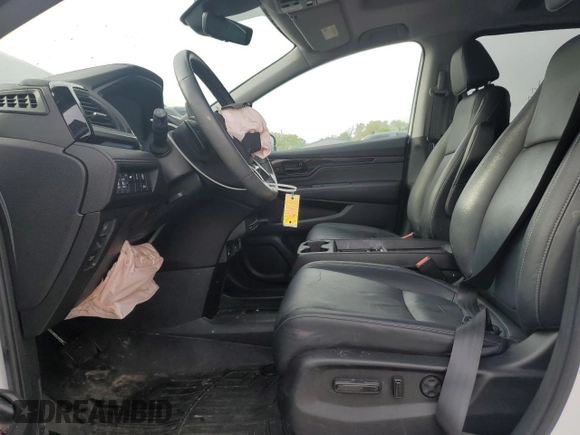 2023 Honda Odyssey Touring с VIN 5FNRL6H82PB004008, выставлен на аукционе Copart как лот 55772415 с пробегом 36 936 миль миль и Списание • Salvage title. История ставок и продаж доступна на DreamBid. Изображение 7.