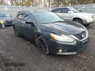 2016 Nissan Altima 2.5 S with VIN 1N4AL3AP3GC200023, listed as a IAAI auction lot 41559993 with 126,594 mi miles. Bid and sale history available at carsss.com. Image 1.