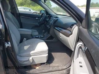 2011 Kia Sorento LX with VIN 5XYKTDA28BG157022, listed as a IAAI auction lot 42061926 with 211,826 mi miles. Bid and sale history available at carsss.com. Image 5.