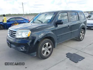 2013 Honda Pilot EX-L with VIN 5FNYF3H51DB019778, listed as a IAAI auction lot 40711477 with 165,505 mi miles and . Bid and sale history available at DreamBid. Image 2.