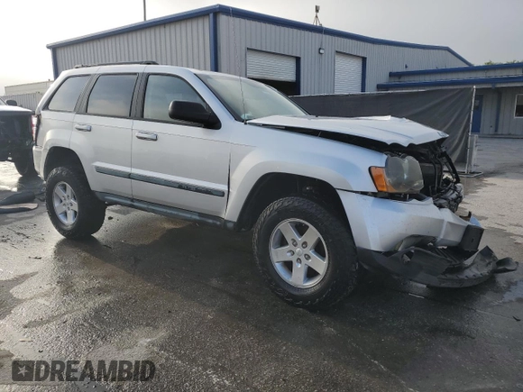 2008 Jeep Grand Cherokee with VIN 1J8HS48N48C127261, listed as a Copart auction lot 51450315 with 153,145 mi miles and Salvage title. Bid and sale history available at DreamBid. Image 4.