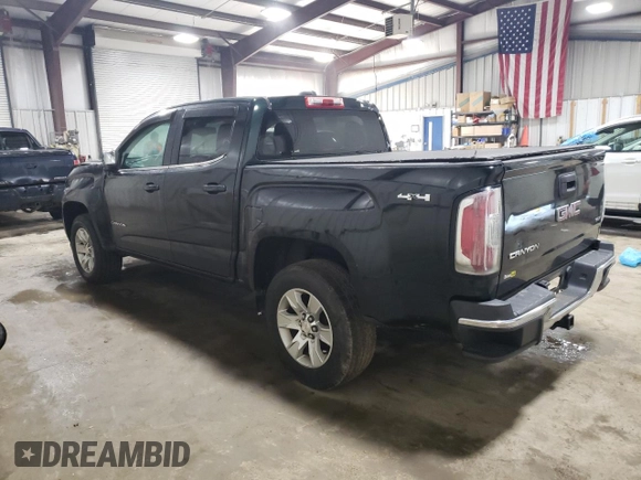 2015 GMC Canyon 4WD SLE with VIN 1GTG6BE38F1258880, listed as a Copart auction lot 57887664 with 142,346 mi miles and Salvage Title. Bid and sale history available at carsss.com. Image 2.