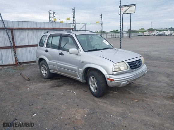 2000 Suzuki Grand Vitara JLX with VIN JS3TD62V5Y4117740, listed as a IAAI auction lot 42088696 with 166,484 mi miles. Bid and sale history available at carsss.com. Image 1.