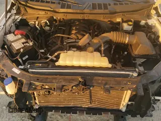 2023 Ford F-150 XL с VIN 1FTEX1C57PKF99511, выставлен на аукционе Copart как лот 80437125 с пробегом 75 569 миль миль и Списание • Salvage title. История ставок и продаж доступна на DreamBid. Изображение 13.