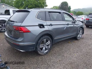 2021 Volkswagen Tiguan SE z VIN 3VV2B7AXXMM070228, wystawiony jako IAAI lot #42295644 z przebiegiem 89 576 mil mil oraz . Historia ofert i sprzedaży dostępna na DreamBid. Obrazek 4.