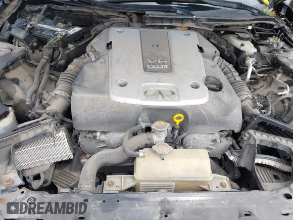 2014 Infiniti Q50 Premium z VIN JN1BV7AR4EM695666, wystawiony jako IAAI lot #42437594 z przebiegiem 141 008 mil mil oraz . Historia ofert i sprzedaży dostępna na DreamBid. Obrazek 10.