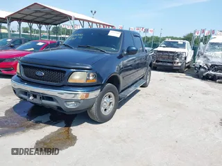 2001 Ford F-150 XLT with VIN 1FTRW08L71KC63676, listed as a IAAI auction lot 42536000 with 326,699 mi miles and . Bid and sale history available at DreamBid. Image 2.