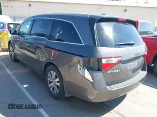 2012 Honda Odyssey EX-L with VIN 5FNRL5H65CB012428, listed as a IAAI auction lot 42164272 with 256,253 mi miles and . Bid and sale history available at carsss.com. Image 3.