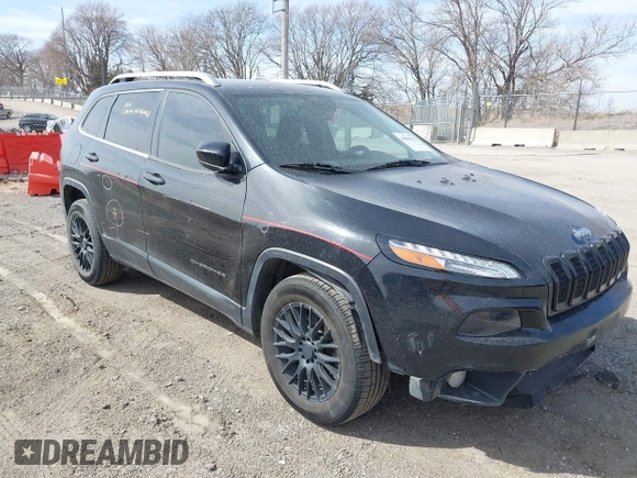 2015 Jeep Cherokee North with VIN 1C4PJMCS7FW544792, listed as a IAAI auction lot 41801573 with 140,575 mi miles. Bid and sale history available at carsss.com. Image 1.