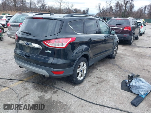 2014 Ford Escape SE with VIN 1FMCU0GXXEUA88622, listed as a IAAI auction lot 41727642 with 22,358 mi miles and . Bid and sale history available at DreamBid. Image 4.