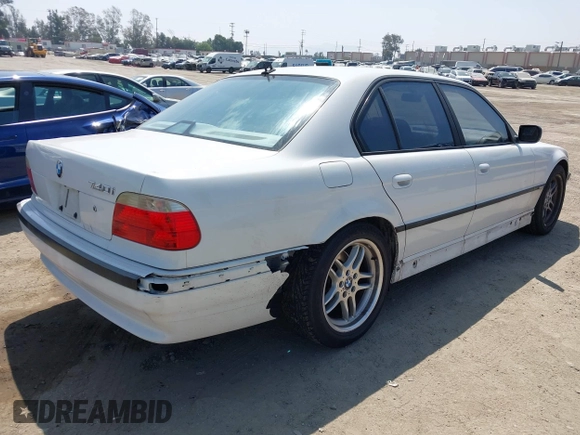 2001 BMW 7 Series 740iA with VIN WBAGG83451DN86421, listed as a IAAI auction lot 42104053 with 241,586 mi miles. Bid and sale history available at carsss.com. Image 4.