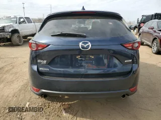2017 Mazda CX-5 Grand Touring with VIN JM3KFBDL8H0163179, listed as a Copart auction lot 49866865 with 53,066 mi miles and Salvage Title. Bid and sale history available at carsss.com. Image 6.