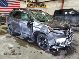 2021 Honda Passport Elite z VIN 5FNYF8H05MB021597, wystawiony jako Copart lot #44463515 z przebiegiem Nie podano mil oraz Szkoda całkowita • Salvage title. Historia ofert i sprzedaży dostępna na DreamBid. Obrazek 4.