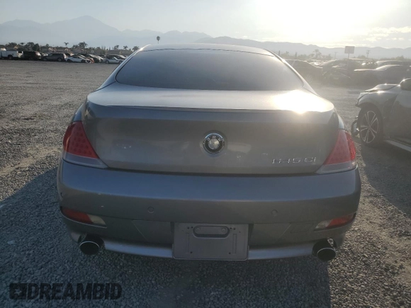 2004 BMW 6 Series 645Ci z VIN WBAEH73434B190924, wystawiony jako Copart lot #74318214 z przebiegiem 121 317 mil mil oraz Czysty tytuł • Clean title. Historia ofert i sprzedaży dostępna na DreamBid. Obrazek 6.