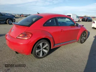 2012 Volkswagen Beetle 2.0T Black Turbo Launch Edition PZEV with VIN 3VWVA7AT8CM655414, listed as a Copart auction lot 47628025 with 94,105 mi miles and Salvage Title. Bid and sale history available at carsss.com. Image 3.