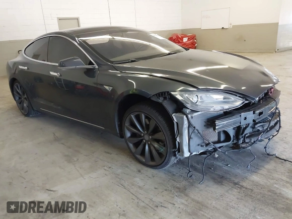 2014 Tesla Model S 60 with VIN 5YJSA1H13EFP49912, listed as a IAAI auction lot 41716661 with 129,776 mi miles and . Bid and sale history available at DreamBid. Image 1.