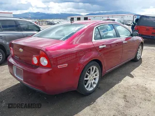 2011 Chevrolet Malibu LTZ with VIN 1G1ZE5E1XBF119559, listed as a IAAI auction lot 42095401 with 145,157 mi miles and . Bid and sale history available at DreamBid. Image 4.