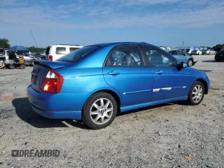 2005 Kia Spectra LX z VIN KNAFE121655113045, wystawiony jako Copart lot #61199595 z przebiegiem 156 310 mil mil oraz Szkoda całkowita • Salvage title. Historia ofert i sprzedaży dostępna na DreamBid. Obrazek 3.