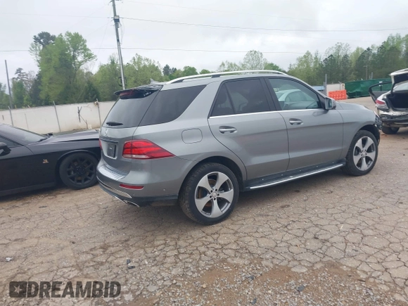 2016 Mercedes-Benz GLE 350 with VIN 4JGDA5JB8GA742920, listed as a IAAI auction lot 41957662 with 99,896 mi miles and . Bid and sale history available at DreamBid. Image 4.