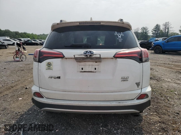 2016 Toyota RAV4 XLE with VIN 2T3RFREV6GW534253, listed as a Copart auction lot 59189645 with 139,420 mi miles and Salvage title. Bid and sale history available at DreamBid. Image 6.