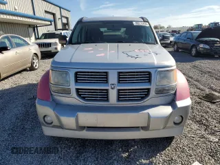 2010 Dodge Nitro SXT z VIN 1D4PT5GKXAW108802, wystawiony jako Copart lot #80215434 z przebiegiem 225 908 mil mil oraz Szkody całkowita. Historia ofert i sprzedaży dostępna na DreamBid. Obrazek 5.
