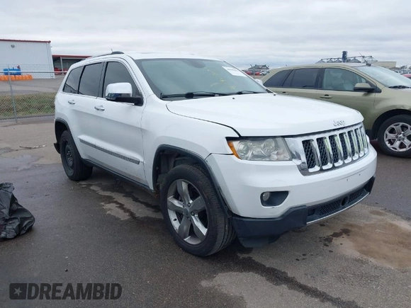 2013 Jeep Grand Cherokee Overland with VIN 1C4RJECG3DC620873, listed as a IAAI auction lot 40909601 with 195,374 mi miles. Bid and sale history available at carsss.com. Image 1.