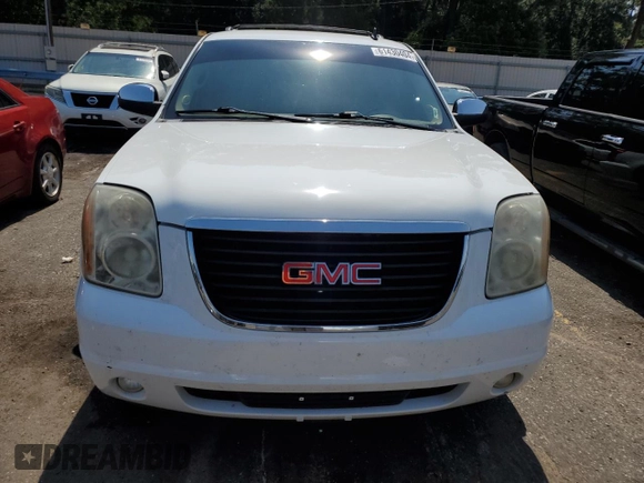 2009 GMC Yukon SLT w/4SA with VIN 1GKEC33309R214195, listed as a Copart auction lot 61430404 with 174,776 mi miles and Salvage Title. Bid and sale history available at carsss.com. Image 5.