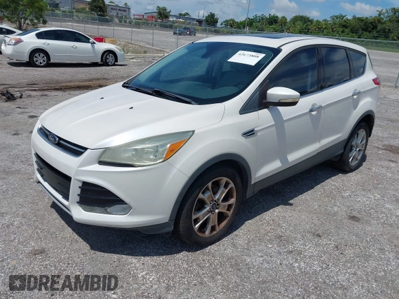 2013 Ford Escape SEL z VIN 1FMCU0H94DUD22476, wystawiony jako IAAI lot #42673808 z przebiegiem 215 811 mil mil oraz . Historia ofert i sprzedaży dostępna na DreamBid. Obrazek 2.