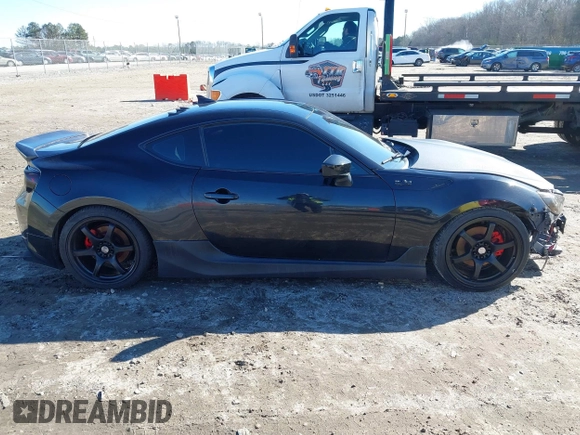 2014 Scion FR-S z VIN JF1ZNAA14E9708590, wystawiony jako IAAI lot #41278089 z przebiegiem 117 357 mil mil oraz . Historia ofert i sprzedaży dostępna na DreamBid. Obrazek 14.