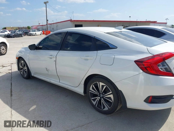 2017 Honda Civic EX-L z VIN 19XFC1F78HE008832, wystawiony jako IAAI lot #42455986 z przebiegiem 103 466 mil mil oraz . Historia ofert i sprzedaży dostępna na DreamBid. Obrazek 14.