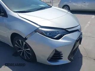 2019 Toyota Corolla L with VIN 5YFBURHE5KP877691, listed as a IAAI auction lot 42108591 with 85,813 mi miles and . Bid and sale history available at DreamBid. Image 17.