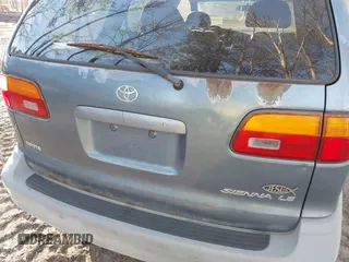 2000 Toyota Sienna LE with VIN 4T3ZF13C5YU181671, listed as a IAAI auction lot 41733892 with 212,013 mi miles. Bid and sale history available at carsss.com. Image 6.