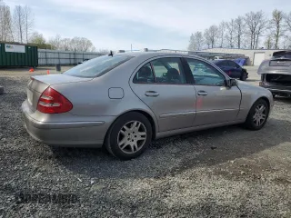 2003 Mercedes-Benz E-Class 3.2L with VIN WDBUF65J33A220573, listed as a Copart auction lot 52085375 with 142,536 mi miles and Salvage Title. Bid and sale history available at carsss.com. Image 3.