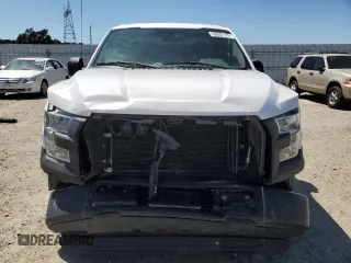 2016 Ford F-150 XL with VIN 1FTMF1C87GKE17279, listed as a Copart auction lot 56022125 with 144,209 mi miles and Salvage title. Bid and sale history available at DreamBid. Image 5.