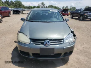2007 Volkswagen Rabbit с VIN WVWCR91K67W102577, выставлен на аукционе Copart как лот 61670645 с пробегом 179 985 миль миль и Списание • Salvage title. История ставок и продаж доступна на DreamBid. Изображение 5.