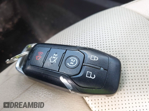 2016 Ford Fusion Titanium with VIN 3FA6P0K96GR400436, listed as a IAAI auction lot 42191256 with 128,447 mi miles and . Bid and sale history available at DreamBid. Image 11.