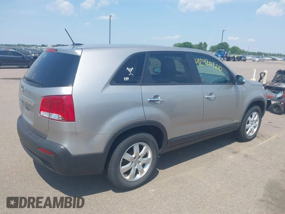 2013 Kia Sorento LX with VIN 5XYKTCA62DG422033, listed as a IAAI auction lot 42420920 with 88,708 mi miles and . Bid and sale history available at DreamBid. Image 4.