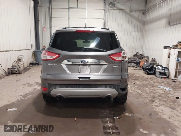 2014 Ford Escape Titanium with VIN 1FMCU9JX9EUA56421, listed as a IAAI auction lot 41392372 with 117,234 mi miles. Bid and sale history available at carsss.com. Image 17.